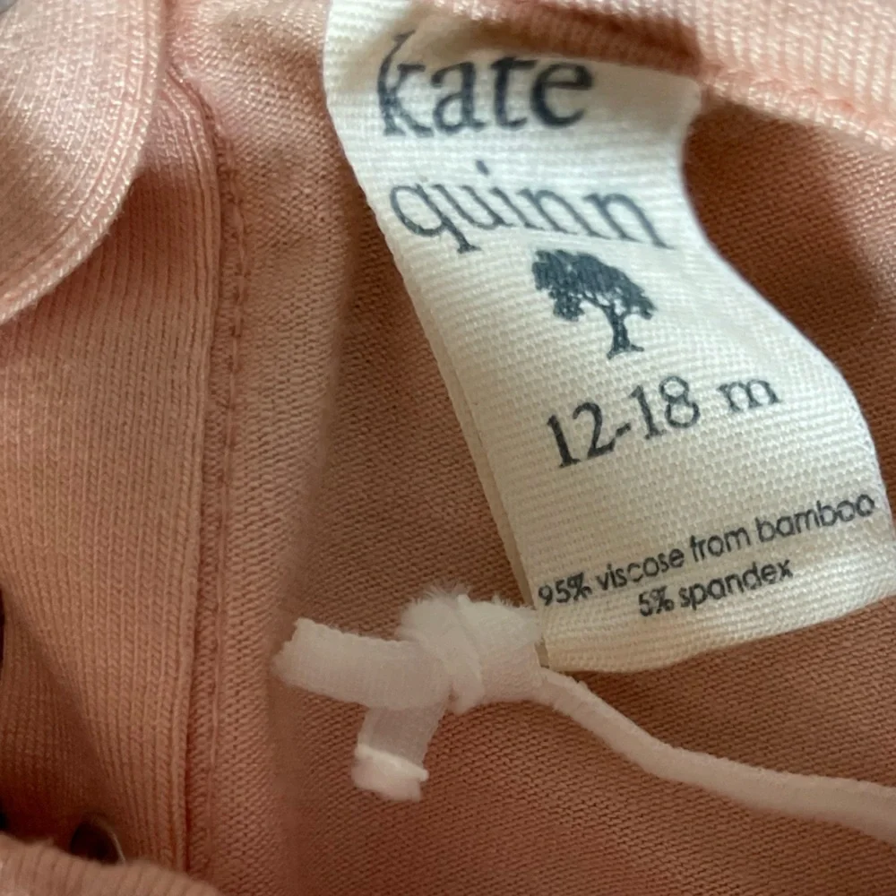 #224 kate quinn Apricot Short Sleeve Bodysuit with Peter Pan collar, sz 12-18 mo